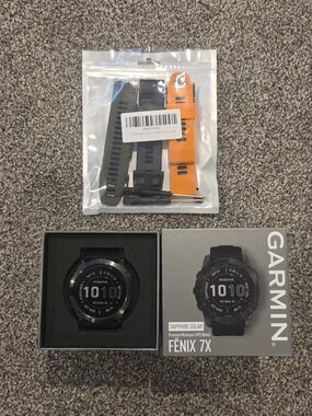Garmin Fenix 7X Sapphire Solar GPS Watch - Black with Orange Strap
